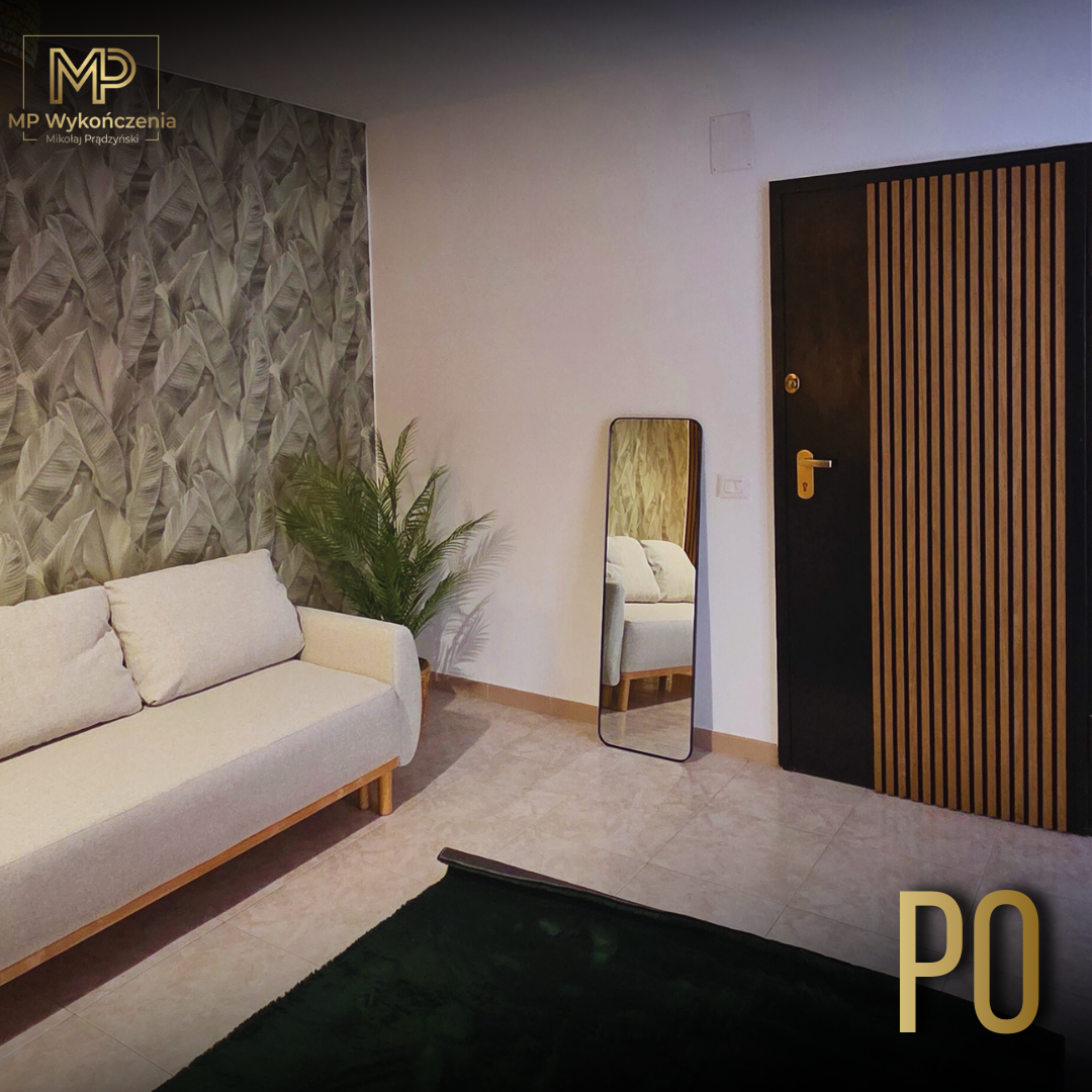 Salon po remoncie - elegancki salon z tapetą w liście